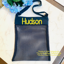 Load image into Gallery viewer, Black mesh bag with 'Hudson' printed in yellow on a white surface with blue flowers.