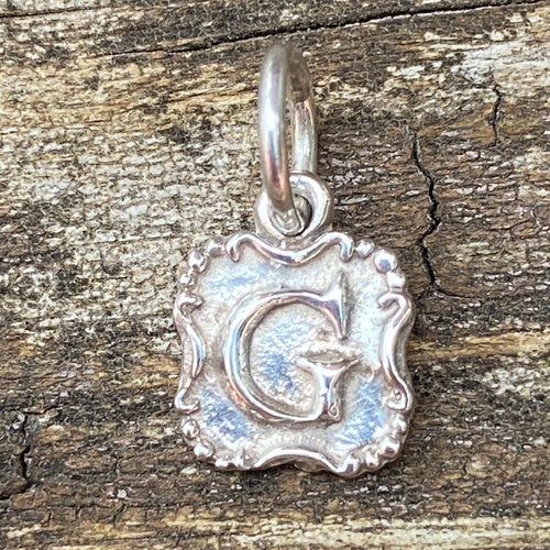 Waxing Poetic Crest Insignia Charm Letter G