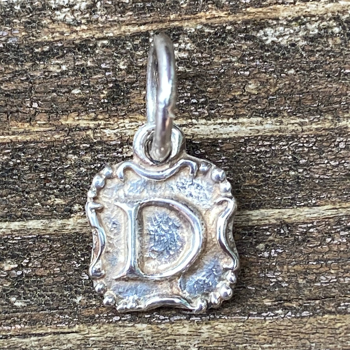 Waxing Poetic Crest Insignia Charm Letter D