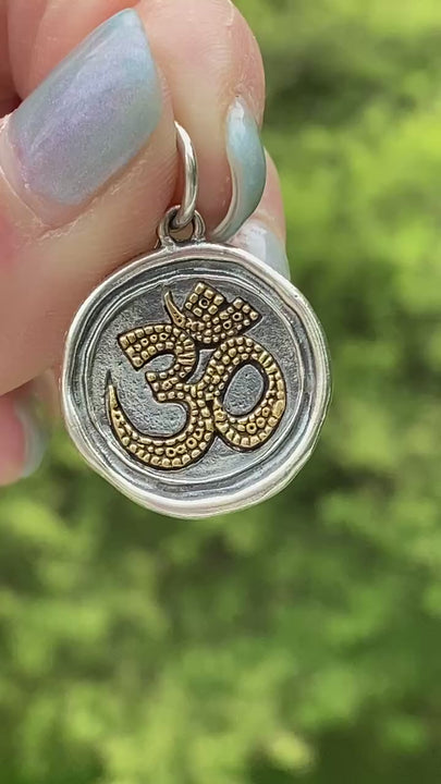 Waxing Poetic Om Charm